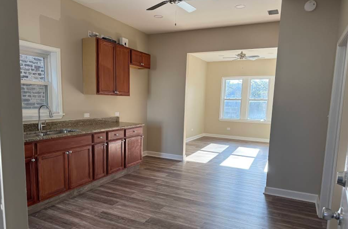 Wood kitchen cabinets and hardwood flooring
