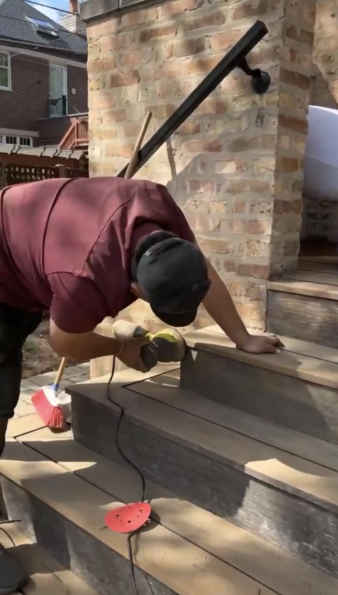 Professional sanding and prep work details before staining wood steps